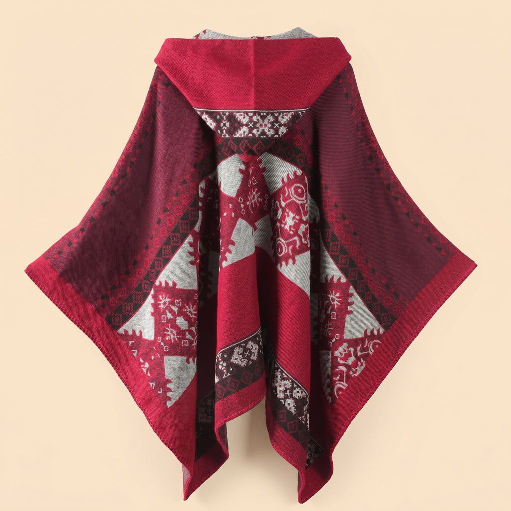 Cape poncho femme ouverte rouge à franges présentée à plat, vue de dos