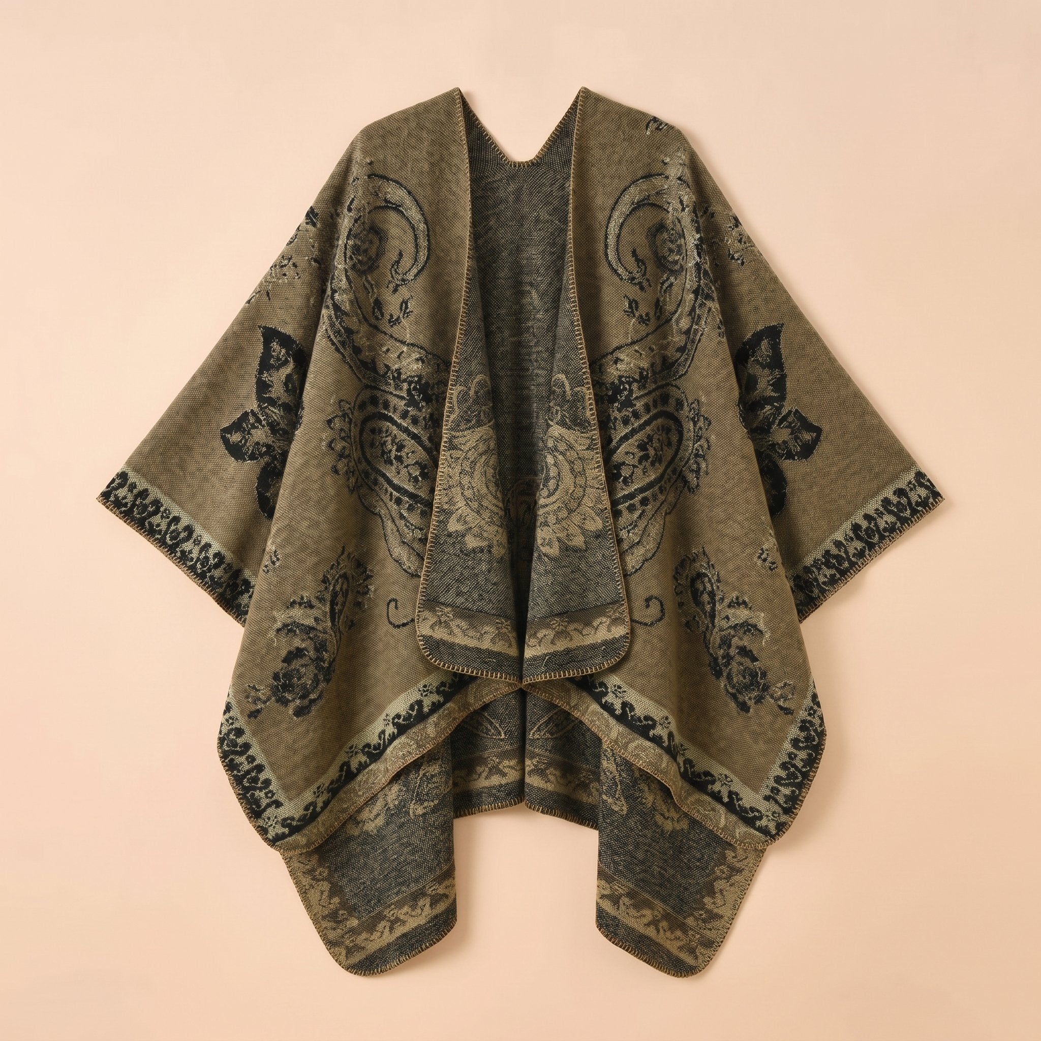 Poncho cape femme motif Paisley kaki, présenté à plat, montrant les détails du motif.