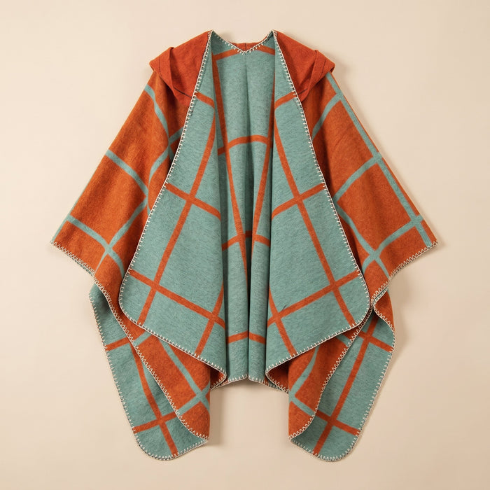 Poncho cape homme à carreaux chaud, orange et bleu-vert, présenté à plat, ouvert, avec sa capuche visible