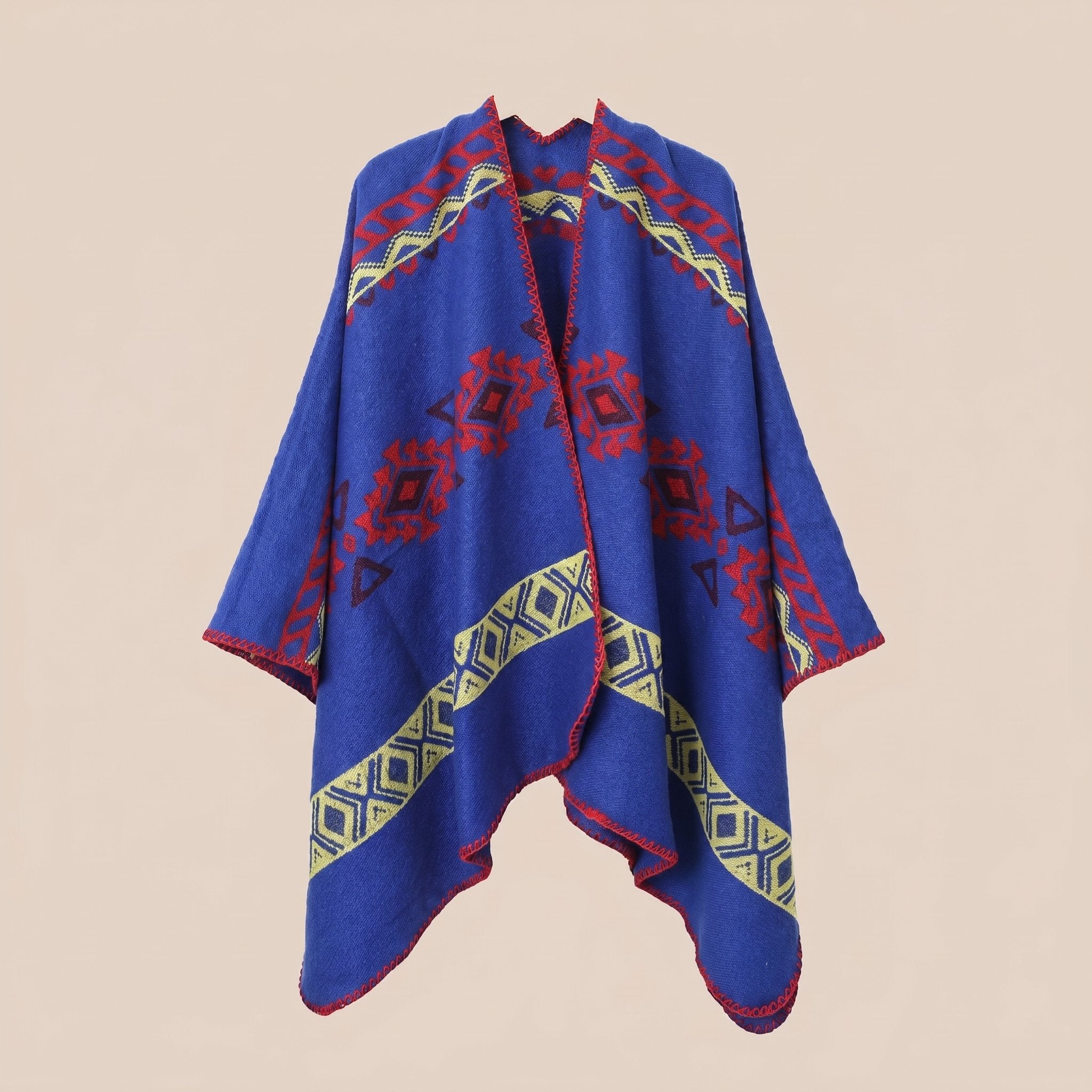 Poncho cape homme ethnique bleu roi, présenté à plat sur un fond clair et uni.