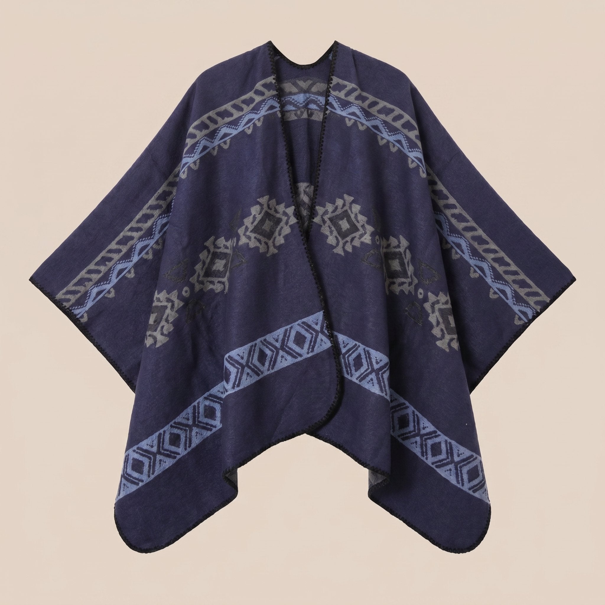 Poncho cape homme ethnique bleu marine, visible à plat sur un fond beige.