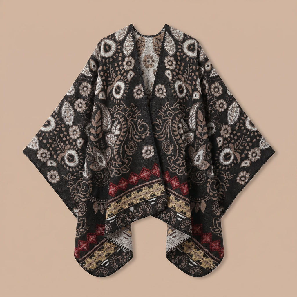 Poncho cape homme motif Paisley crème, présenté à plat sur un fond uni.