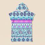 Poncho serviette à capuche adulte Ethnique turquoise : vue à plat sur fond crème