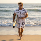 Poncho serviette à capuche adulte Visages au trait porté à la plage