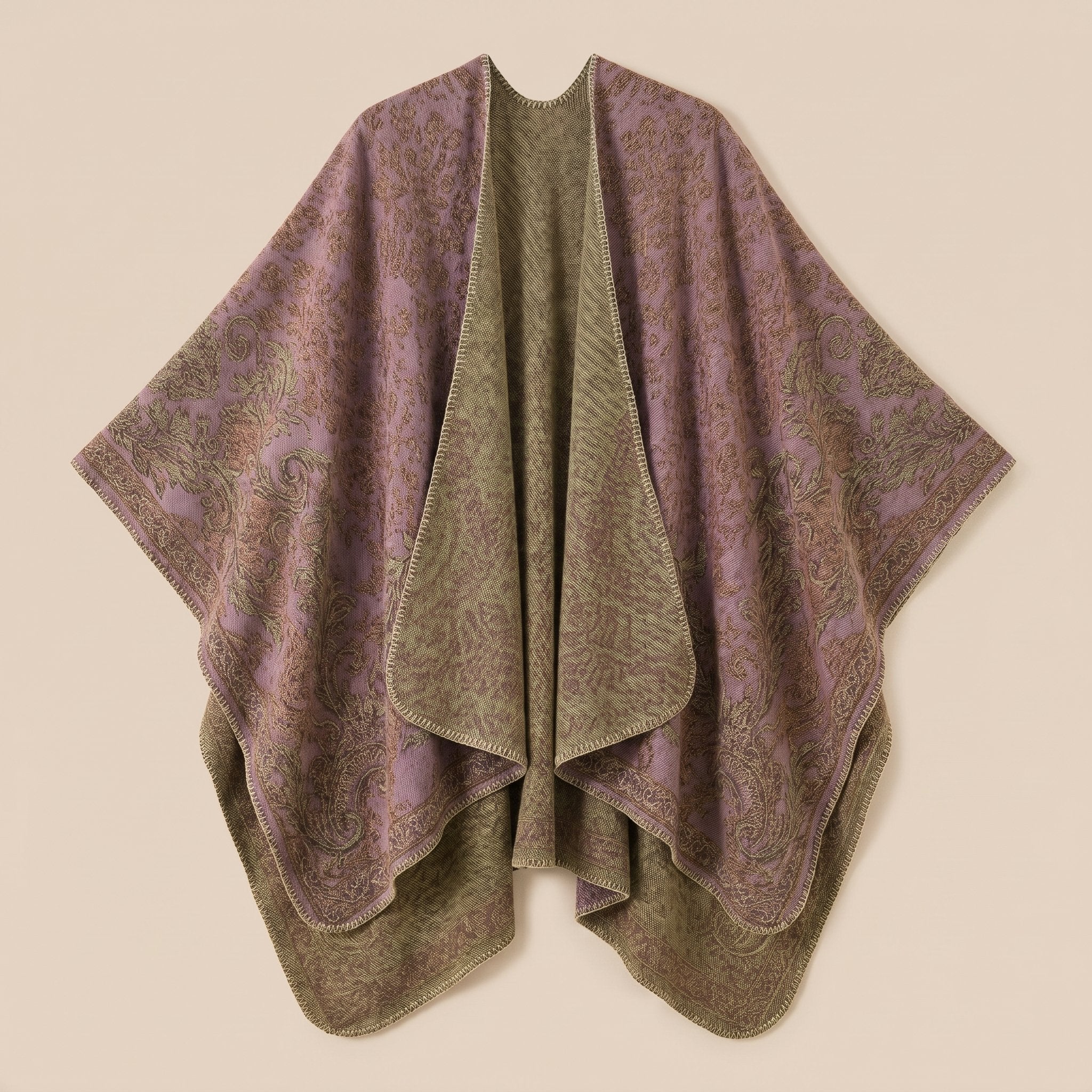 Poncho tricot femme, cape ouverte à motif paisley lilas et kaki, présentée à plat, montrant ses motifs floraux